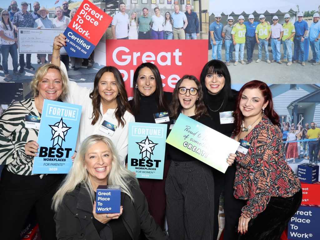 Hayden Homes team members celebrating 2025 Best Workplace for Women and Parents honors during the company’s annual Forecast event.