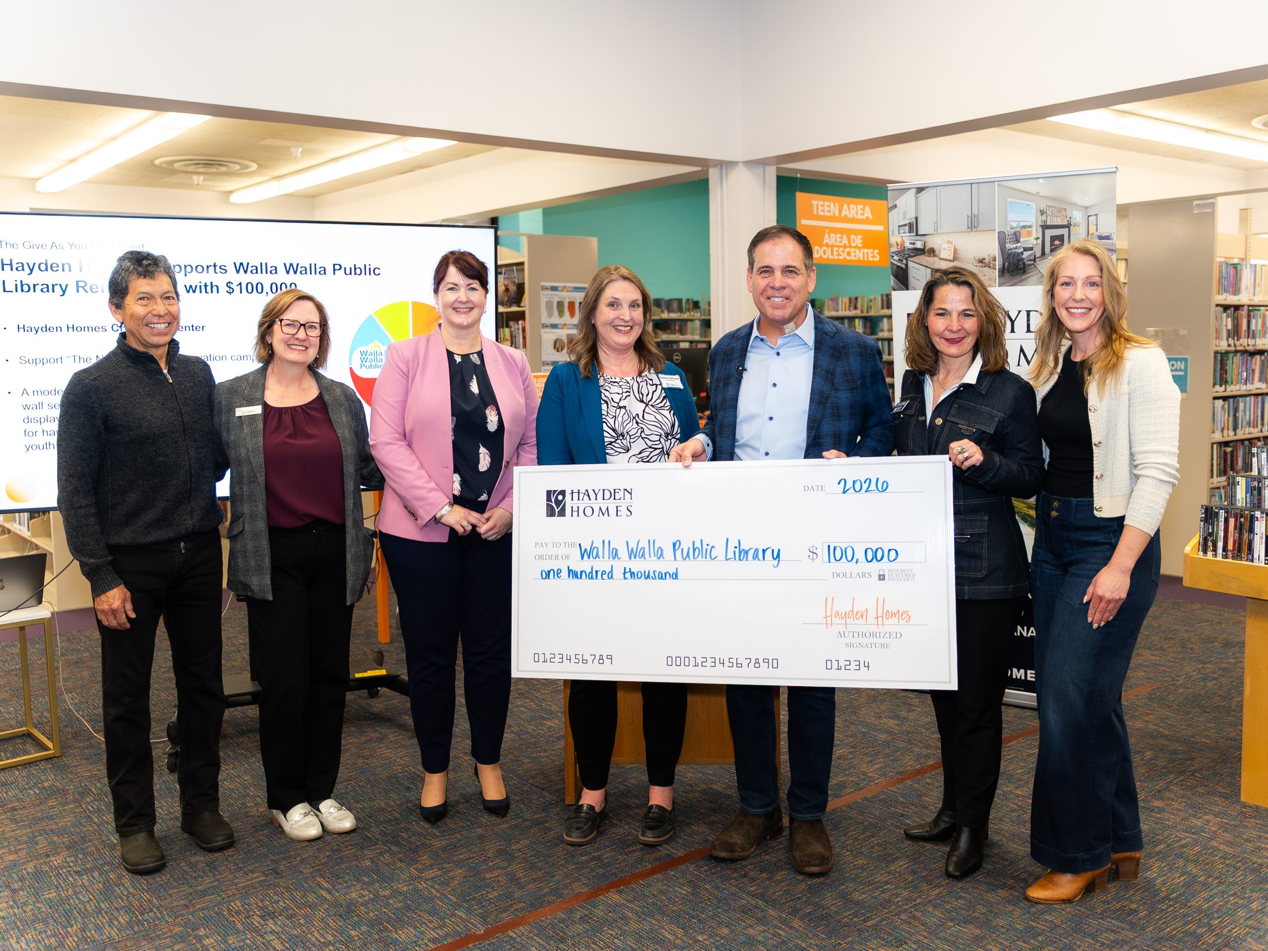 Hayden Homes celebrate the launch of the Give As You Go Fund and present a $100,000 donation to the Walla Walla Public Library for the new Hayden Homes Creativity Center.